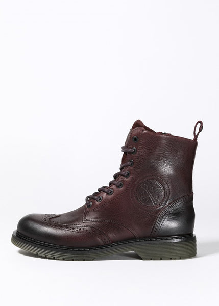 a Women's motorcycle boot in burgundy from John Doe from the side