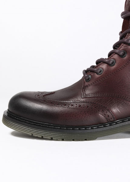 A close up of a toe of Women's motorcycle boot in burgundy from John Doe