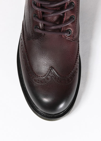 A close up of Women's motorcycle boot in burgundy from John Doe