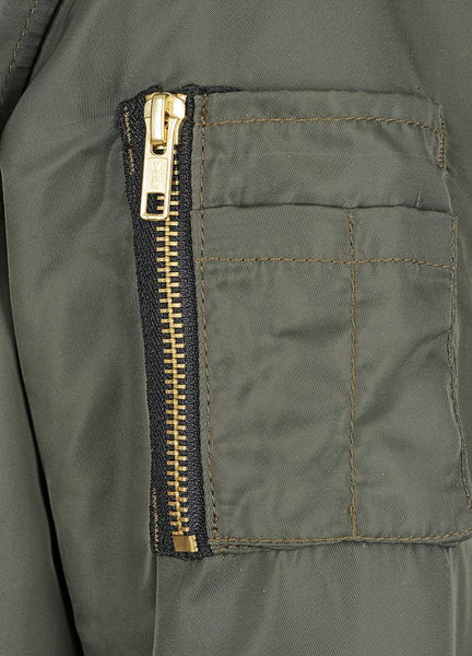 A pocket with golden zip of the green bomber women's motorcycle jacket Glory from Black Arrow Label 