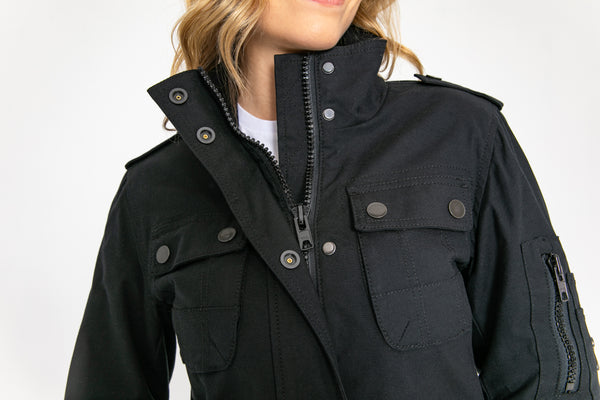 a close up of the neck zipper on BLACK army style women's motorcycle jacket from John Doe