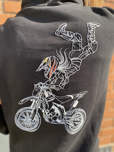 A drawing of a girl driving a birt bike on the women's motorcycle sweatshirt 