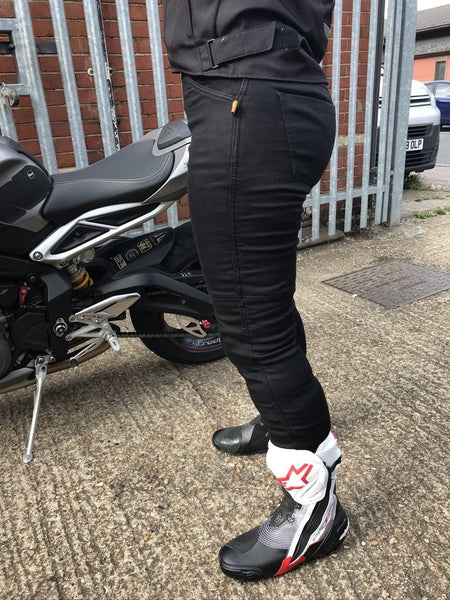 Legs of a woman wearing black Melissa motorcycle jeggings from Moto Girl