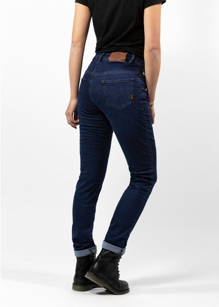 Woman's legs from the back wearing dark blue high waisted women's motorcycle jeans from JohnDoe