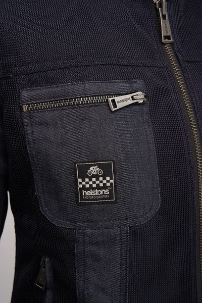 a close up of the front pocket on a helstons denim womens motorcycle jacket