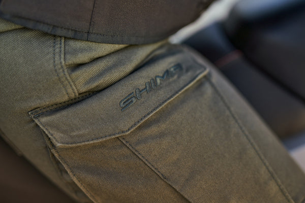 A close up of the pocket of Khaki green women's motorcycle cargo pants GIRO from shima
