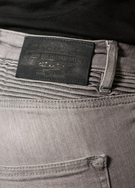 A close up of the John Doe patch on the light grey women's motorcycle jeans 