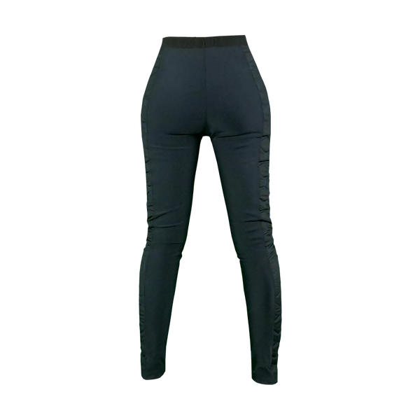 Women's motorcycle leggings from exagon66 in black and green from the back 