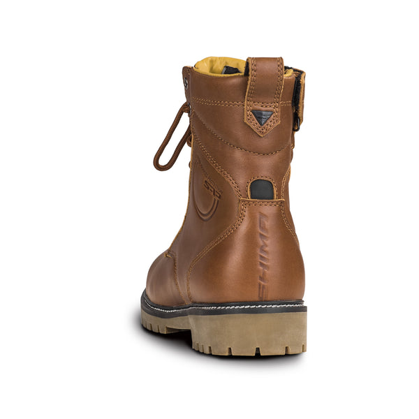 The heel of a Thomson brown leather women motorcycle boot from Shima